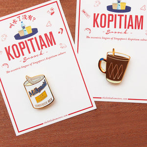 The familiar Milkmaid Condensed Milk brooch shown here pays tribute to our alternative to milk for coffee (that's Kopi for you), and our unhealthy, yet oh-so-delicious replacement for butter to bread.